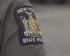 Die New Yorker Staatspolizei übernimmt den Rettungsdienst von Syracuse während der Beerdigung eines gefallenen Beamten